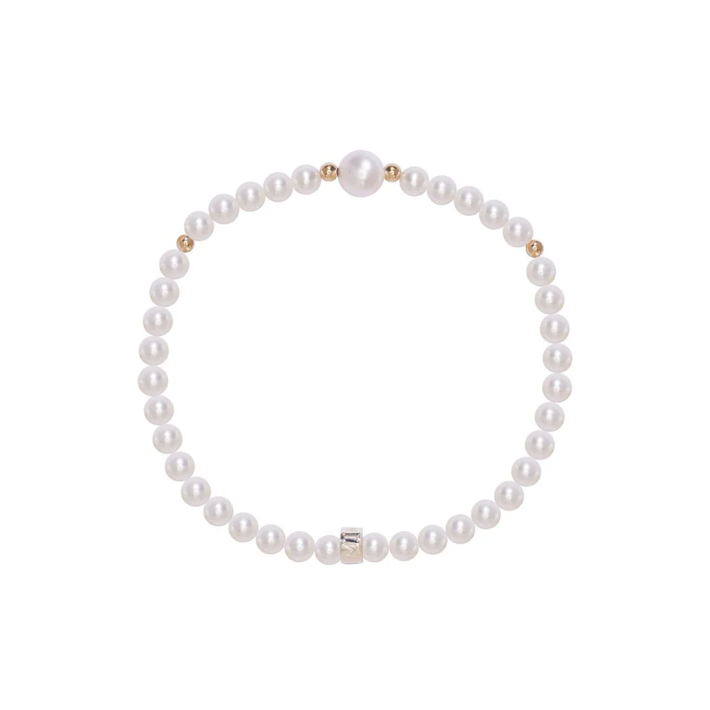 Bracciale Elastica perle bianche e palline in oro | Mimí